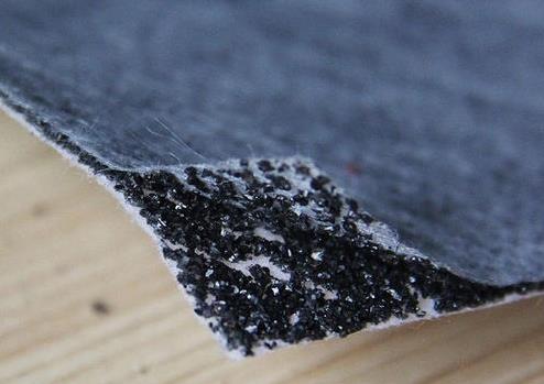 Laminated carbon filter material