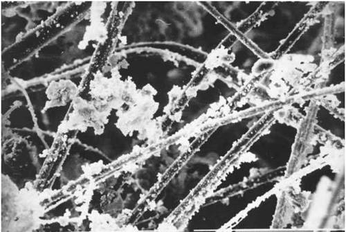 Multi filtrarion mechanisms in fiber-based filter material